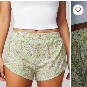 Fabletics Eco Run Shorts with Green and Cream Design